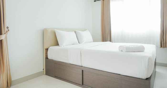 Bedroom Homey and Comfortable Studio at Amethyst Apartment By Travelio