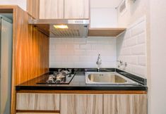 Ruang Umum 4 Comfy Design Studio Apartment at Grand Kamala Lagoon By Travelio