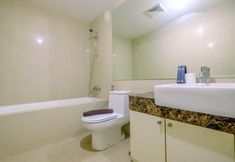 In-room Bathroom 6 Comfy and Warm 2BR Apartment at Casa Grande Residence By Travelio