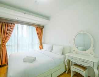 Bedroom 2 Comfy and Warm 2BR Apartment at Casa Grande Residence By Travelio