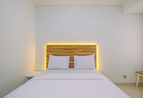 Bedroom Cozy and Comfortable Studio Room at Transpark Cibubur Apartment By Travelio