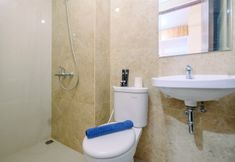 In-room Bathroom 4 Cozy and Comfortable Studio Room at Transpark Cibubur Apartment By Travelio