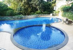 Swimming Pool 6 Comfy & Stylish Studio at Dago Suites Apartment By Travelio