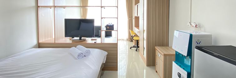 Lobby Comfy & Stylish Studio at Dago Suites Apartment By Travelio