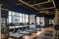 Fitness Center Minimalist and Homey 1BR Apartment at Ciputra World 2 By Travelio