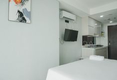 Common Space 3 Comfort and Cozy Studio Apartment at Daan Mogot City By Travelio