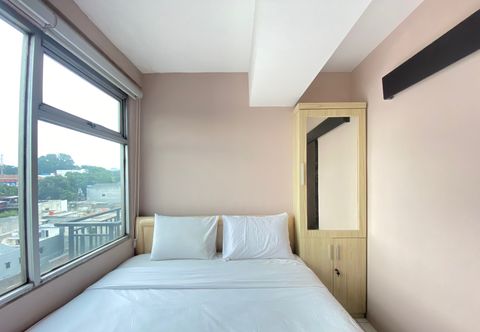 Bedroom Roomy 2BR at Jarrdin Cihampelas Apartment By Travelio