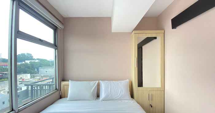 Bedroom Roomy 2BR at Jarrdin Cihampelas Apartment By Travelio