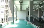 Swimming Pool 6 Cozy Studio Apartment at Stanford Jatinangor By Travelio