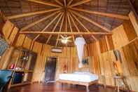 ห้องนอน Mekong Silt Ecolodge
