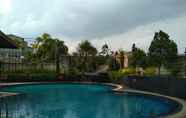 Swimming Pool 7 Spacious 2BR at Grand Setiabudi Apartment By Travelio