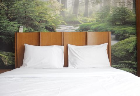 Bedroom Spacious 2BR at Grand Setiabudi Apartment By Travelio