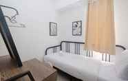 Bedroom 2 Comfy and Best Choice 3BR at Bassura City Apartment By Travelio