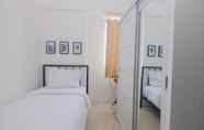 Bedroom 3 Comfy and Best Choice 3BR at Bassura City Apartment By Travelio