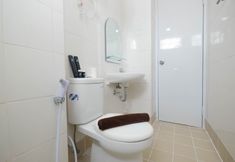 In-room Bathroom 7 Comfy and Best Choice 3BR at Bassura City Apartment By Travelio