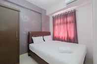 Kamar Tidur Comfort 2BR Apartment @ Green Pramuka City By Travelio