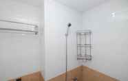 In-room Bathroom 6 Comfort 2BR Apartment @ Green Pramuka City By Travelio