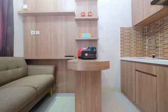 Common Space 4 Comfort 2BR Apartment @ Green Pramuka City By Travelio