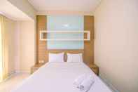 Kamar Tidur Comfy and Simple Studio Room at Tamansari Sudirman Apartment By Travelio
