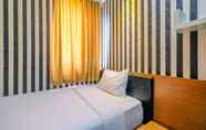 Bedroom 3 Comfy & Glitzy 3BR Residence at Grand Palace Kemayoran Apartment By Travelio