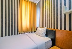 Bedroom 3 Comfy & Glitzy 3BR Residence at Grand Palace Kemayoran Apartment By Travelio