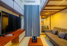 Common Space 2 Comfort Living and Homey Studio Room at Dave Apartment By Travelio