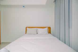 Bedroom 4 Comfort 1BR at Evenciio Margonda Apartment By Travelio