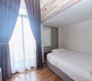 Kamar Tidur 2 Cozy and Comfortable Stay Studio at Dave Apartment By Travelio