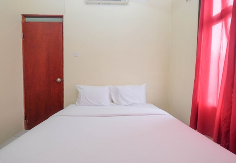 Kamar Tidur Comfy and Nice 1BR Apartment at MT Haryono Residence By Travelio