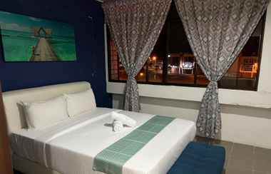 Phòng ngủ 2 Cassia Inn Kuching