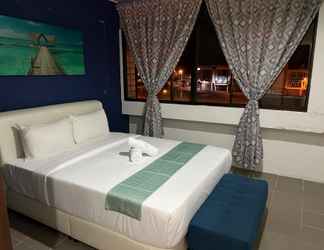 Phòng ngủ 2 Cassia Inn Kuching