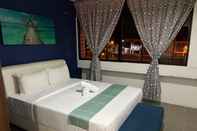 Phòng ngủ Cassia Inn Kuching
