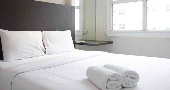 Bilik Tidur Cozy High Floor 1BR Apartment at Parahyangan Residence By Travelio