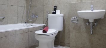 In-room Bathroom 4 Spacious 1BR Apartment with Great View at Marbella Suites Dago By Travelio