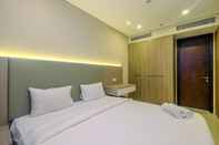 Kamar Tidur Cozy and Nice 2BR Apartment at Ciputra World 2 By Travelio