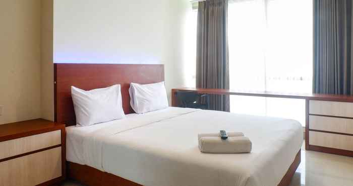 Kamar Tidur Exclusive and Vibrant 1BR at Praxis Apartment By Travelio