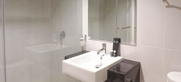 In-room Bathroom 4 Exclusive and Vibrant 1BR at Praxis Apartment By Travelio