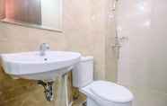 In-room Bathroom 6 Elegant and Comfy 3BR Apartment at Transpark Cibubur By Travelio
