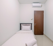 Bedroom 2 Elegant and Comfy 3BR Apartment at Transpark Cibubur By Travelio