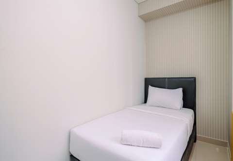 Bedroom Elegant and Comfy 3BR Apartment at Transpark Cibubur By Travelio