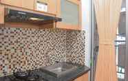 Common Space 3 Comfortable 2BR at Bassura City Apartment By Travelio