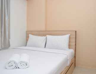 Bedroom 2 Comfortable 2BR at Bassura City Apartment By Travelio