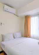 BEDROOM Comfortable and Tidy 2BR Apartment at Cinere Resort By Travelio