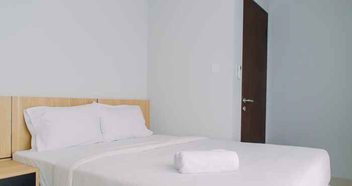 Bedroom Comfy and Elegant 2BR Transpark Bintaro Apartment By Travelio