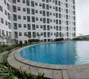 Swimming Pool 7 Comfy and Nice Studio at Serpong Garden Apartment By Travelio