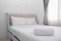 ห้องนอน Comfort and Best Deal 2BR at Bassura City Apartment By Travelio
