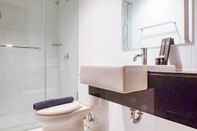 In-room Bathroom Stunning and Cozy 1BR Apartment at Praxis By Travelio