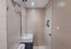 In-room Bathroom 5 Tidy and Comfortable Studio Apartment at Saveria BSD City By Travelio