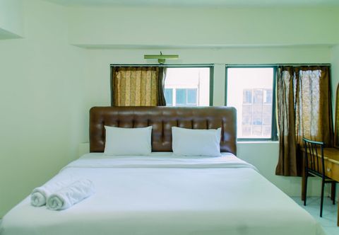 Bedroom Homey and Spacious 3BR at Kondominium Rajawali Apartment By Travelio