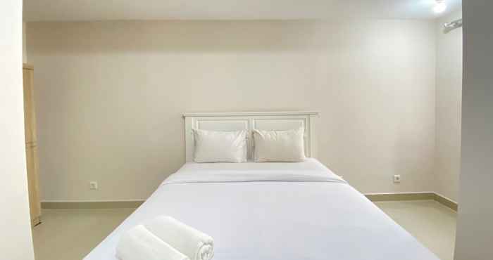 Kamar Tidur Spacious 2BR Plus at Sudirman Suites Bandung Apartment By Travelio